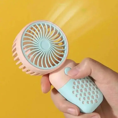 AirWhirl™ – Compact Rechargeable Fan for Pocket Cooling on the Go