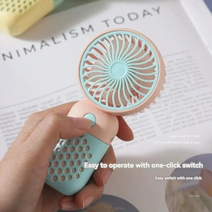 AirWhirl™ – Compact Rechargeable Fan for Pocket Cooling on the Go